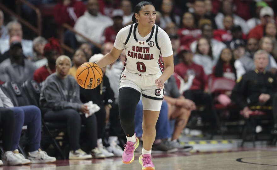Te-Hina Paopao brings the ball up during an NCAA game on Feb. 22.