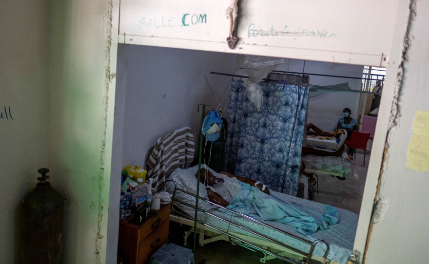 COVID patients receive treatment at the St. Luke Foundation for Haiti Hospital in Port-au-Prince, Haiti, on July 16. The country received its first shipment of COVID vaccine doses in July.