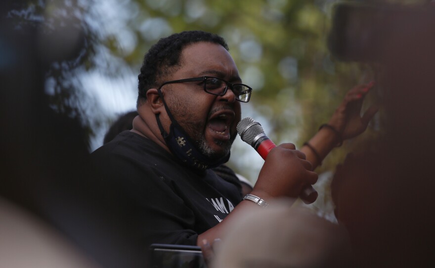 Jacob Blake Sr., the father of Jacob Blake, who was shot by police in Kenosha, Wisconsin, speaks to protesters after a march Saturday, August 29.