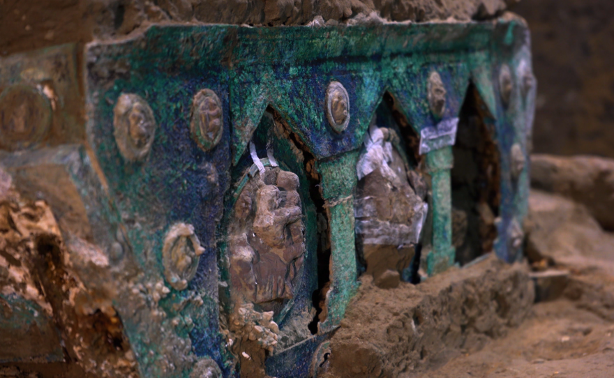 An ornate ceremonial chariot recently discovered in the ruins of Pompeii, decorated with bronze and tin medallions on the sides and rear. SECRETS OF THE DEAD "Last Days of Pompeii"