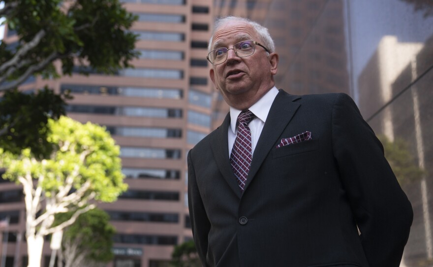 Attorney John Eastman, the architect of a legal strategy aimed at keeping former President Donald Trump in power, talks to reporters after a hearing in Los Angeles, Tuesday, June 20, 2023.