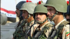Iraqi soldiers attend celebrations for Army Day in the southern city of Basra on Sunday. Soldiers across the country marked the 87th anniversary of the founding of the Iraqi army.