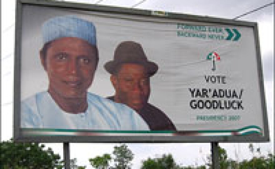 Presidential candidate for the ruling People's Democratic Party (PDP) Umaru Yar'Adua, left, appears on a billboard with running mate, Goodluck Jonathan. Yar'Adua was declared winner of the election on Monday.