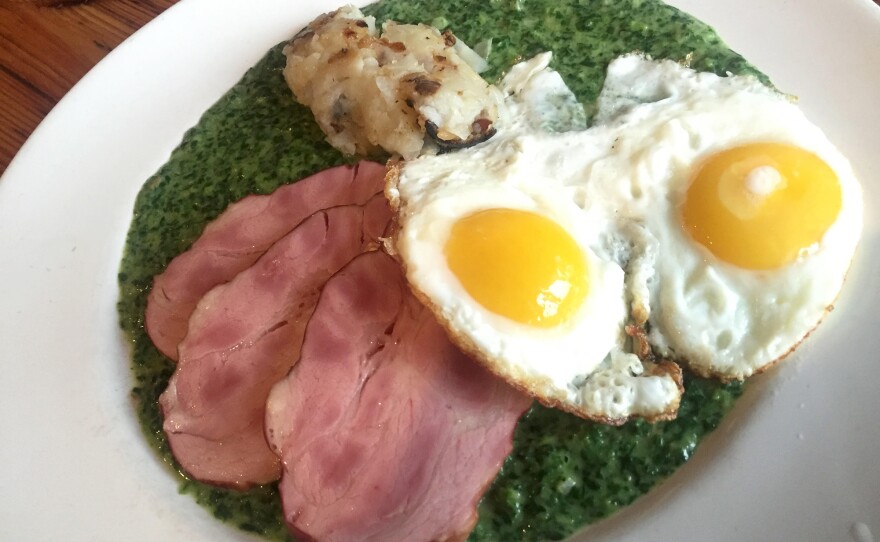 The version served by chef Thomas Ferlesch at Brooklyn's Werkstatt consists of fried eggs on a plate of rösti potatoes, ham and Viennese creamed spinach.