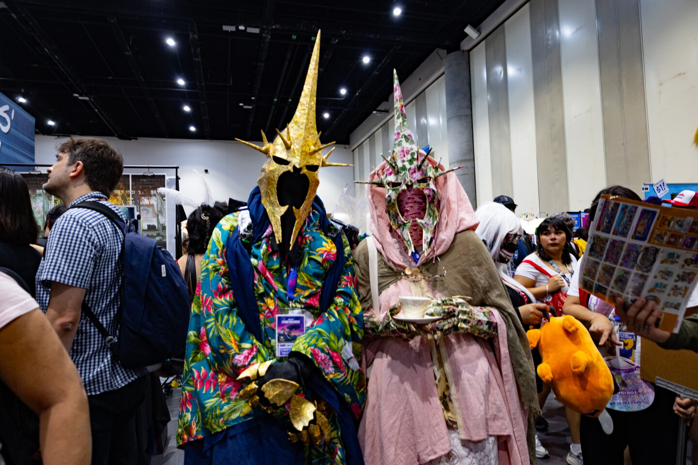 A cosplay couple puts a playful spin on the Witch-king of Angmar from "The Lord of the Rings" at Comic-Con on July 24, 2026.