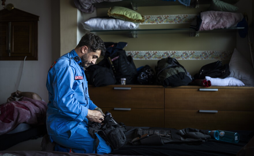 Ali Al Rida Hammoud, a member of the ambulance and paramedic teams in Nabatieh, gets ready before his shift begins on May 13.