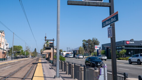 An MTS Orange Line runs parallel to Spring Street in La Mesa on July 29, 2026.