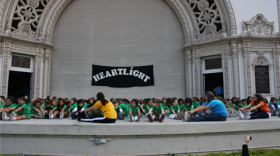 Children stretch as they participate in a Heartlight USA program.