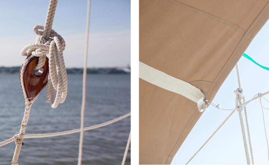 Modern updates include this rope rather than the coconut fiber that was used on Hawaiian canoes in the past. The small flag (right) that flutters above the canvas is one tool that navigators use when they can't see the stars. Knowing the direction the wind is blowing and watching the waves helps them to understand their direction when it is cloudy.