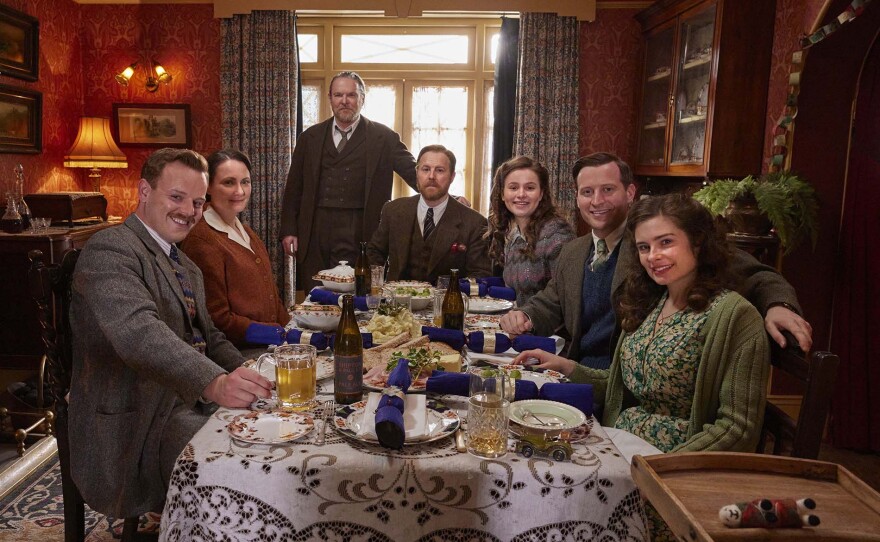 Shown from left to right: Tristan Farnon (Callum Woodhouse), Mrs. Hall (Anna Madeley), Richard Alderson (Tony Pitts), Siegfried Farnon (Samuel West), Jenny Alderson (Imogen Clawson) James Herriot (Nicholas Ralph), Helen Herriot (Rachel Shenton). MASTERPIECE ALL CREATURES GREAT AND SMALL Season 5 Episode 7