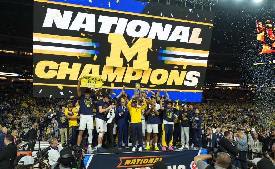 Michigan celebrates after defeating UConn in the NCAA college basketball tournament national championship game at the Final Four, Monday, April 6, 2026, in Indianapolis.