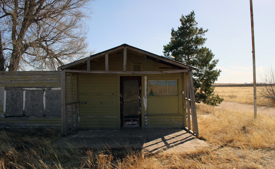 An abandoned gas station is one of the last few remaining buildings at Dearfield.