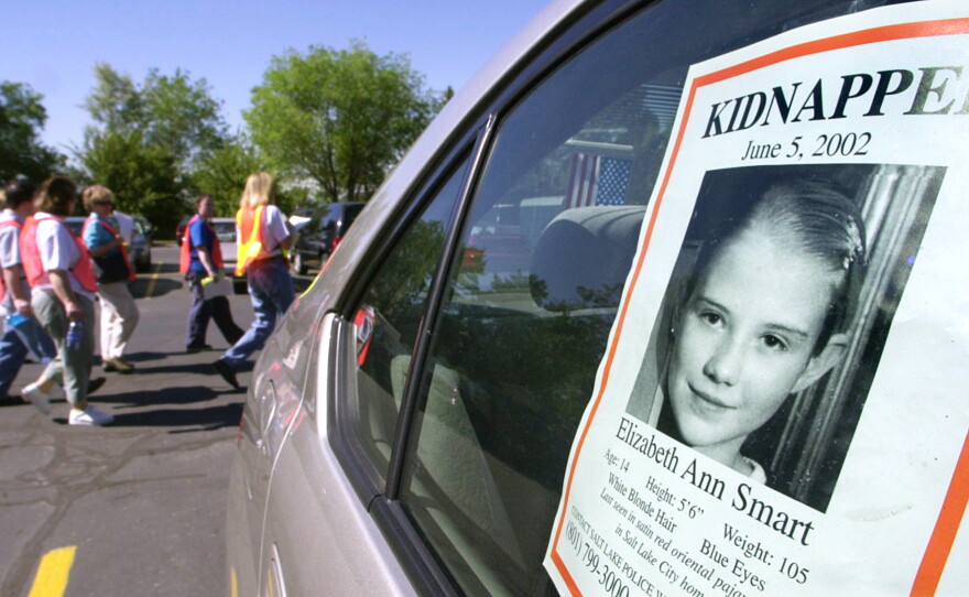 Volunteers head out to search for Elizabeth Smart in Salt Lake City a few days after she was kidnapped in 2002.