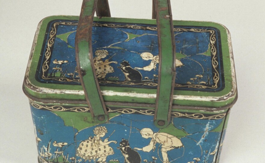 This tin-plated steel lunch box was manufactured by the Ohio Art Company in the 1920s.