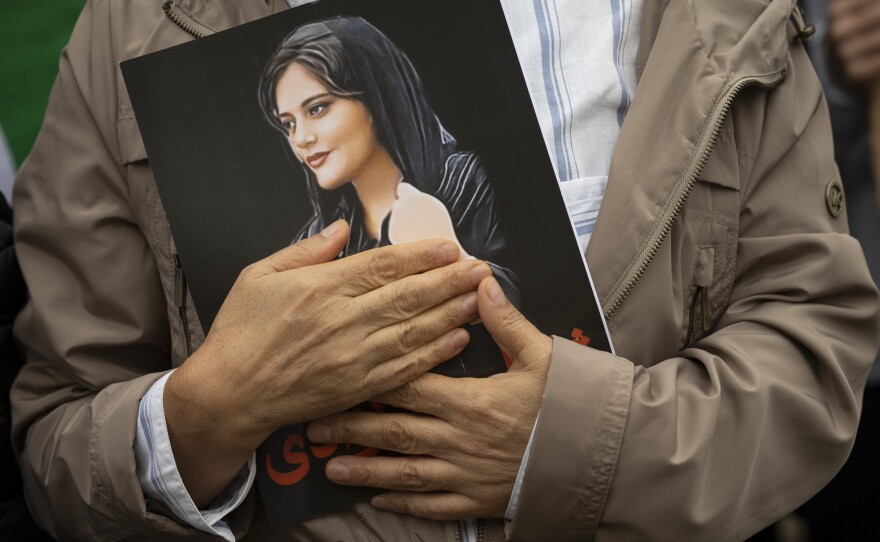 A portrait of Mahsa Amini is held during a rally in Washington, on Oct. 1, 2022. Amini, who also went by her Kurdish name, Jina, died in police custody in Iran last year, sparking worldwide protests against the country's conservative Islamic theocracy. She was awarded the European Union's top human rights prize on Thursday, Oct. 19, 2023.