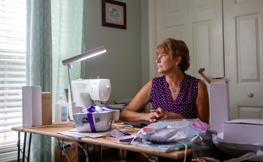 Suzanne Rybak sits inside the craft room at her home in Florence, S.C. In June 2020, in his childhood room across the hall, her son Jameson died of an overdose.