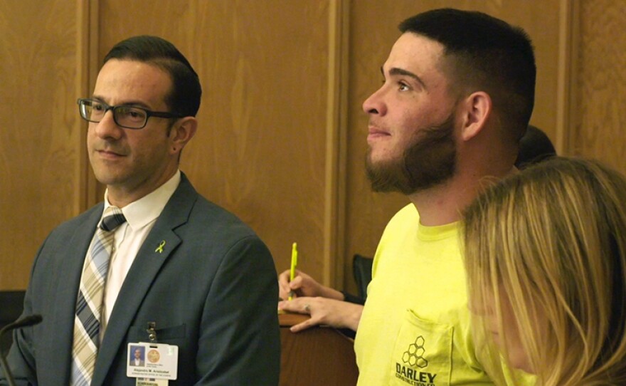 Alejandro Aristizábal (left), Felony Diversion Program Manager for the 11th Judicial Circuit Court, appears in court with Charlie Gonzalez (center), a Jail Diversion Project client, in the Gerstein courthouse. Miami-Dade, Florida (undated photo).