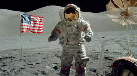 Astronaut Eugene Cernan walks on the moon. Cernan was commander of the mission, and still holds the distinction of being the last man to walk on the Moon's surface on December 11, 1972.