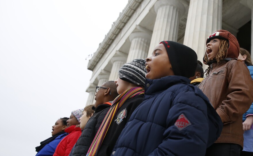 After the speech, the whole class sings three Civil-Rights-inspired songs together, including "We Shall Overcome."