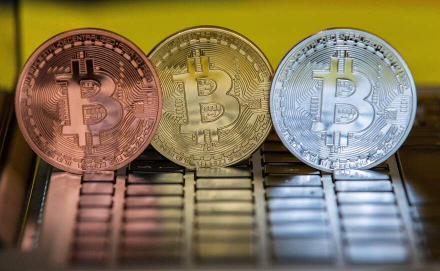 The digital cryptocurrency Bitcoin, shown in a February 6 visual representation, was among the cryptocurrencies targeted by the recent hack of a Japanese exchange.