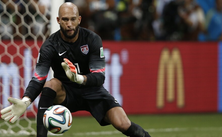 U.S. goalkeeper Tim Howard makes a save during extra-time in the World Cup Round of 16 match with Belgium. Howard's record 16-save performance set off admiration and several Internet memes.