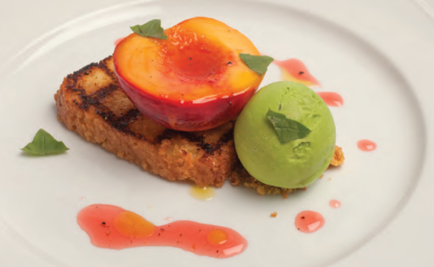 Grilled lemon pound cake topped with slow-roasted nectarines, basil gelato and olive oil drizzle. Yum.