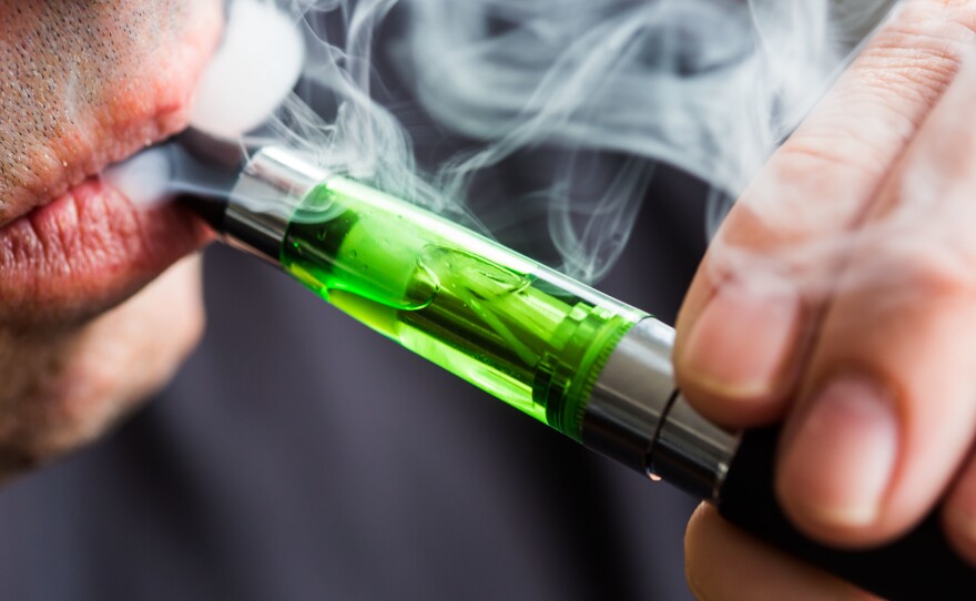 A survey finds 1 in 5 high school seniors was vaping nicotine in 2018.