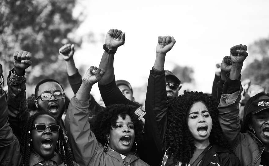 Protesters raise their fists at the October 2015 Million Man March in Washington, D.C.