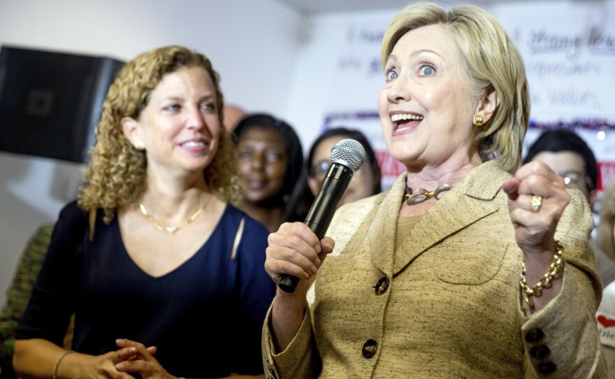 Democratic presidential candidate Hillary Clinton, right, speaks to workers at a campaign office for Rep. Debbie Wasserman Schultz, D-Fla., earlier this month.