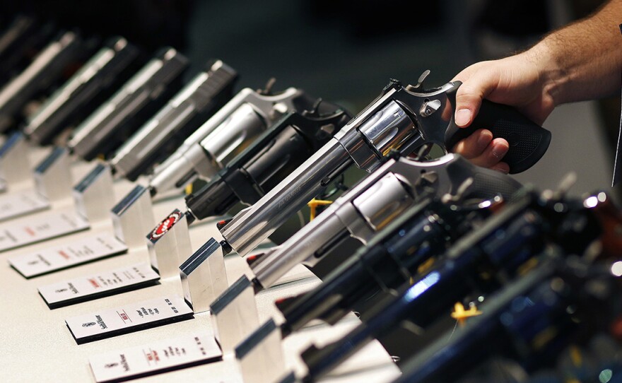 Handguns are displayed at a trade show in Las Vegas in this undated file photo.
