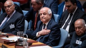 Palestinian Ambassador to the United Nations Riyad Mansour pats his heart during the Kuwait crown prince's address at the High-Level Security Council meeting on Palestinians and Israel during the 80th session of the United Nations General Assembly, Sept. 23, 2025.