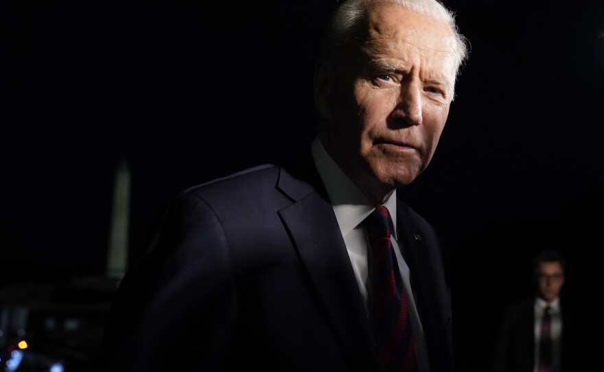 President Biden speaks to reporters on the South Lawn of the White House on July 21 after returning from a trip to Cincinnati.
