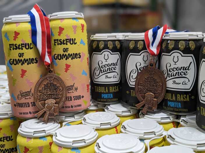 Fistful of Gummies and Tabula Rasa, the award-winning beers from Second Chance Beer Company, pictured with the medals won from the Great American Beer Festival, Sept. 27, 2023.