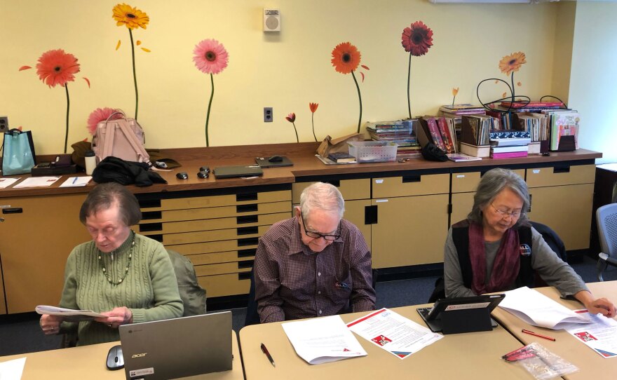 Seniors at the Schweinhaut Senior Center participate in a workshop on spotting fake news. The workshop is organized by the nonprofit Senior Planet.