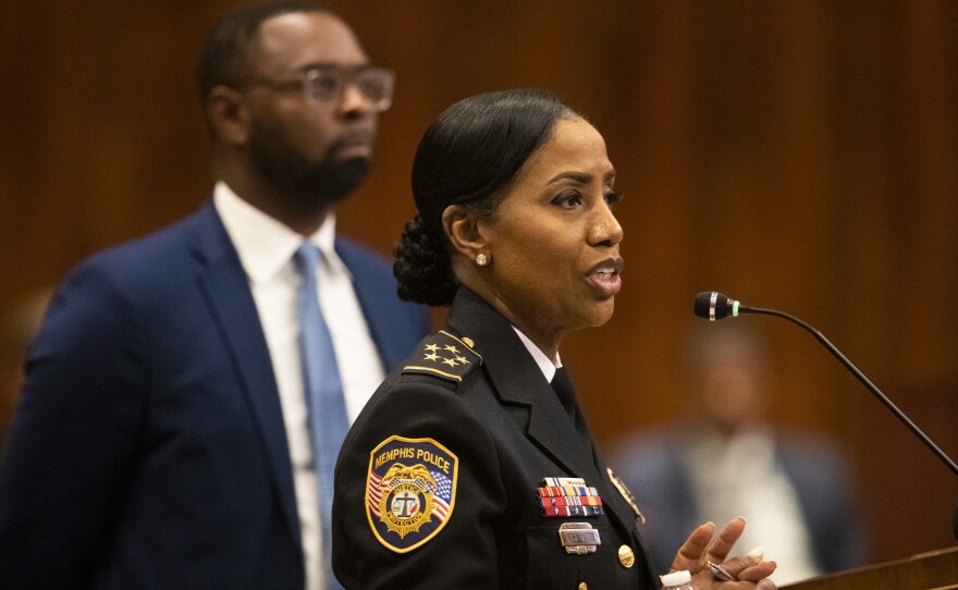 Memphis Police Chief Cerelyn "C.J." Davis speaks to the city council as Mayor Paul Young stands behind her at city hall on Tuesday.