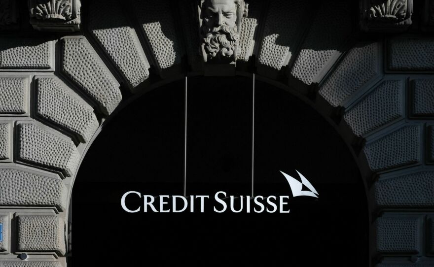 The sign and logo of Credit Suisse bank is seen at their headquarters in Zurich on March 20, 2023. Credit Suisse, a troubled lender that was caught up in a global banking storm, was taken over by rival UBS on Sunday.