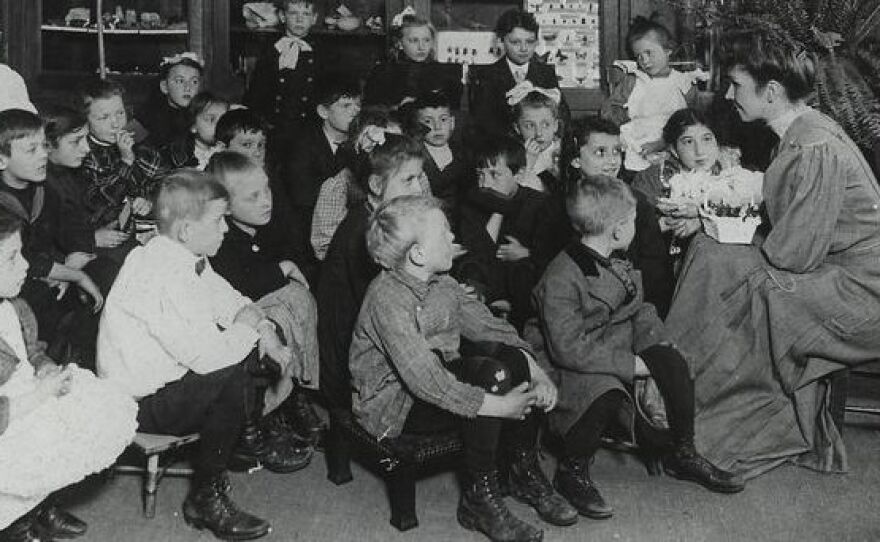 Story Hour at the Carnegie-built Webster branch of the New York Public Library, circa 1910.