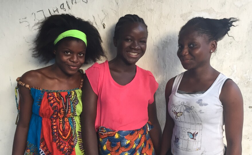 Evelyn Sokpo (from left), 12; Sankay Diallo, 13; and Rita Swen, 13.