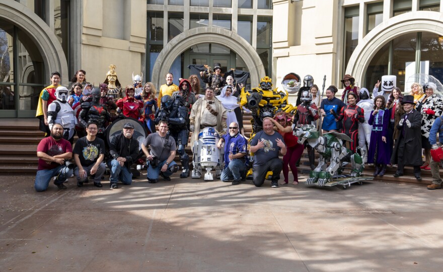 Sci-Fi Coalition president Shawn Alexander Mullen (center and without his Tusken Raider mask) at a previous fan event in North County.