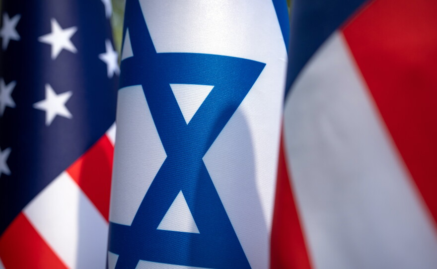 U.S. and Israel flags stand outside of the White House, Monday, July 27, 2026, in Washington.
