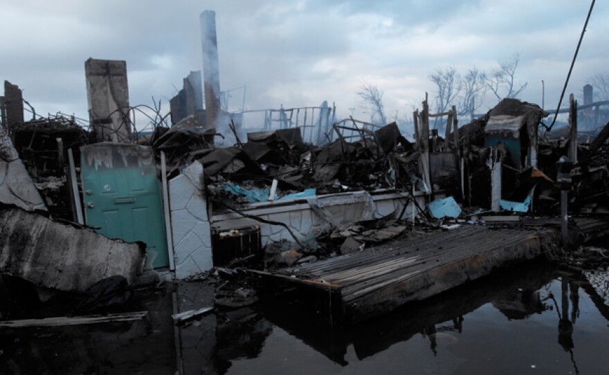 30 October 2012, Queens, New York City, New York State, USA --- The day after "super storm" Sandy, the coastal community of Far Rockaway, Queens remains devastated by fire and flooding.