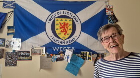 Moira Brown, 93, at her home in Glasgow, where the walls are plastered with Scotland soccer memorabilia.