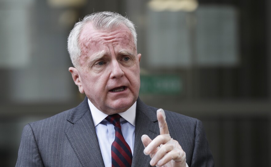 U.S. Ambassador to Russia John Sullivan speaks to the media in Moscow, last year. In a statement on Tuesday, Sullivan said he would return to the U.S. for "consultations" amid deteriorating relations between Washington and Moscow.