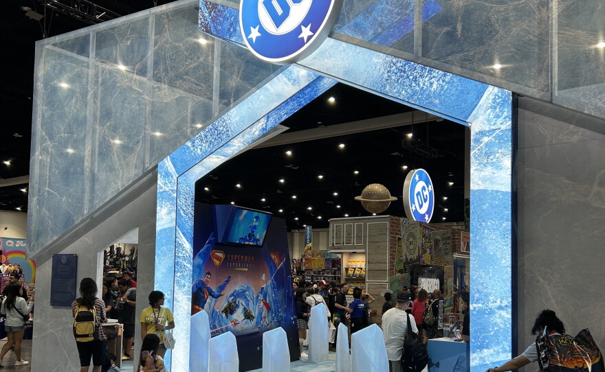 DC's Comic-Con booth focused more on its film and television projects than its comics, reflecting the changing landscape of the comics industry. July 26, 2026.