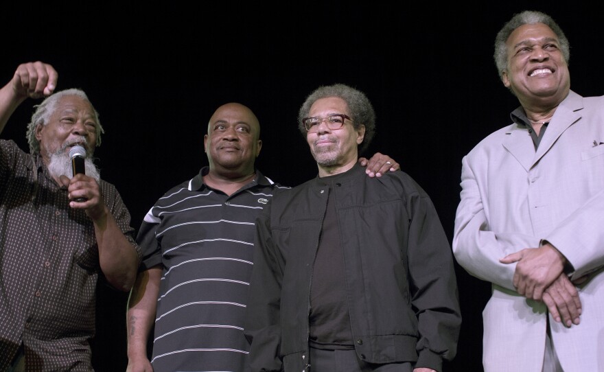 Albert Woodfox, (second from right), with his brother Michael Mable (second from left) at the Ashe Cultural Arts Center in New Orleans in February. Woodfox of the "Angola Three," had just been released from Louisiana State Penitentiary.