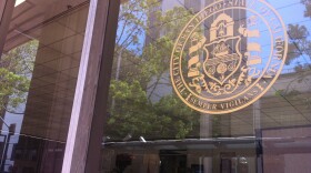 The city of San Diego seal on the city administration building. 