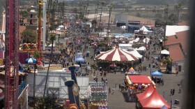 The view from the ferris wheel looking down at the rides at the 2024 San Diego County Fair on June 12, 2024 in Del Mar, California.