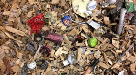 Energy Of The Future? California company Sierra Energy is testing out a reactor that turns garbage — like these wood chips, metal fragments and plastics — into synthetic gas that can then be turned into a low-carbon diesel fuel.