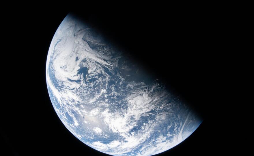 A view of Earth taken by NASA astronaut and Artemis II Commander Reid Wiseman from one of the Orion spacecraft's four windows after completing the translunar injection burn on April 2, 2026.