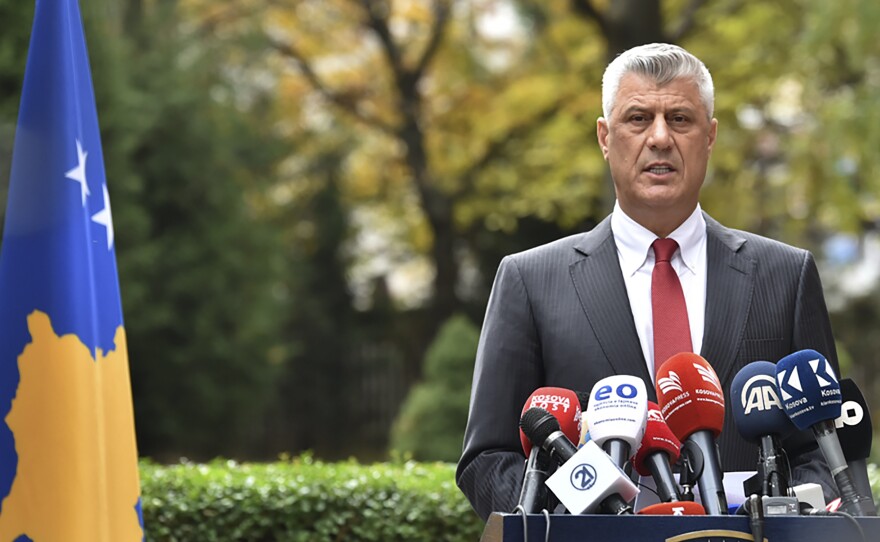 Kosovo President Hashim Thaçi announces his resignation in Kosovo capital Pristina on Thursday. He said he was stepping down to face war crimes charges in The Hague.